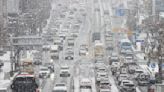 Heavy snow hits Seoul, traffic resumes on Japan highway