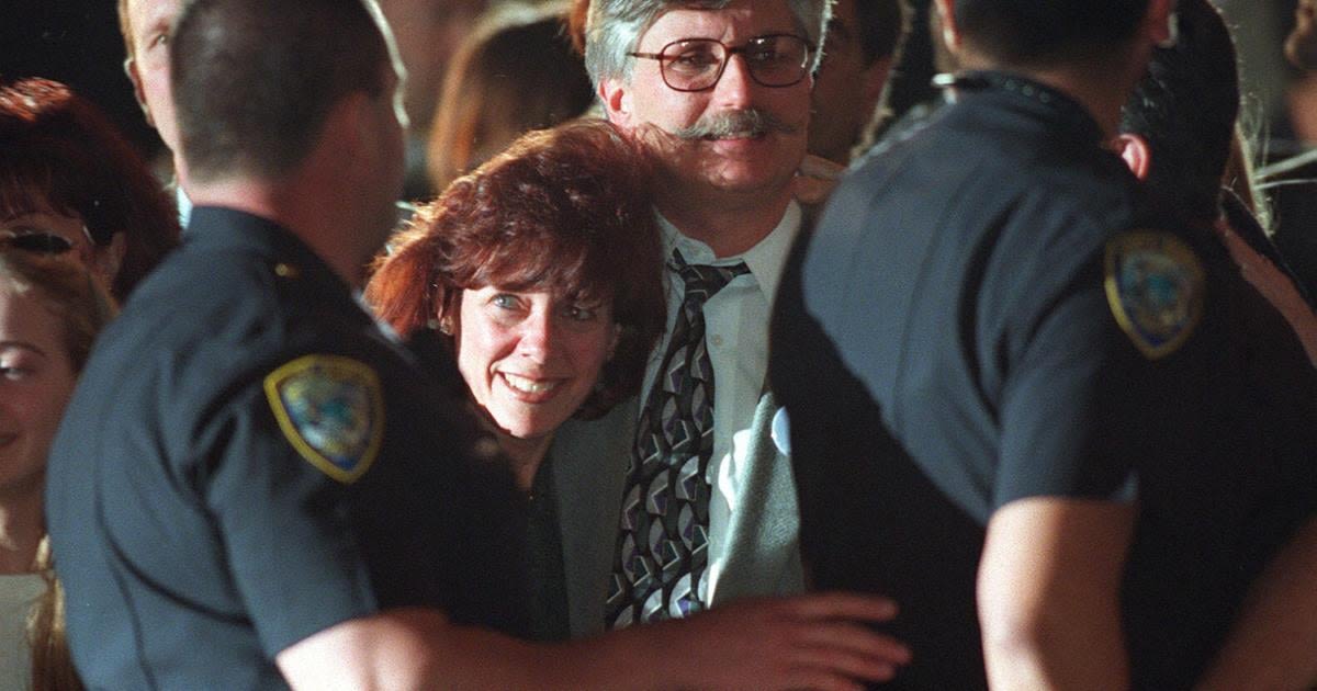 Fred Goldman, center, and his wife, Patti, leave a courthouse in Santa Monica, California, in 1997 after a jury found football star O.J. Simpson guilty in a civil trial involving the slaying of Goldman...