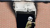 Man dies after 'climbing out of tower block window trying to escape fire'