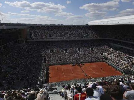 Olympic tennis players return to the red clay of Paris’ Roland Garros after Wimbledon’s grass