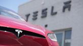 Tesla's stock leaps on reports of Chinese approval for the company's driving software