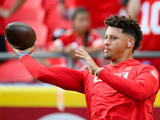 Where does Patrick Mahomes rank among the highest paid QBs?