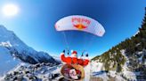 Skiing Santa Claus Delivers Presents To French Ski Resort On Paraglider Wing