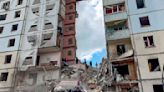 An apartment block collapses in a Russian border city after heavy shelling, killing at least 2