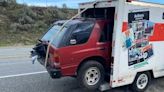 U-Haul and … Ope! Cops Stop U-Haul With an Isuzu Rodeo Hanging Out of It