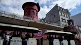 The windmill sails at Paris’ iconic Moulin Rouge have collapsed. No injuries are reported