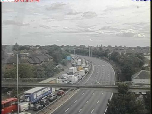 M25 closed with 11 mile tailbacks after lorry and van crash near Dartford Crossing