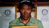 Nepal sherpa scales Everest for record 30th time