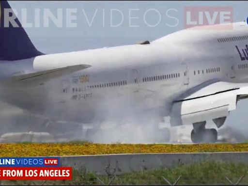 Boeing 747 carrying 345 people bounces on LAX runway during hard landing, video shows