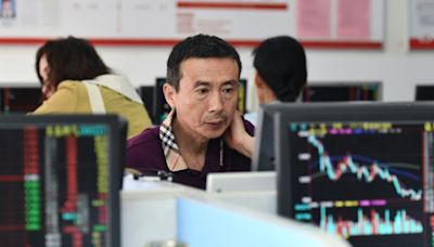 Asian markets track Wall St record as Hong Kong, Shanghai stabilise