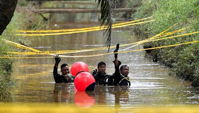 Police divers recover smartphone in ditch near where murder victim Nur Farah Kartini was found