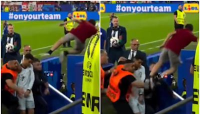 Un fanático de Cristiano Ronaldo se tiró desde la tribuna para abrazarlo y casi termina en tragedia