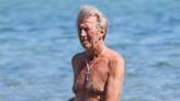 Eric Clapton, 79, goes shirtless while taking a dip in the sea