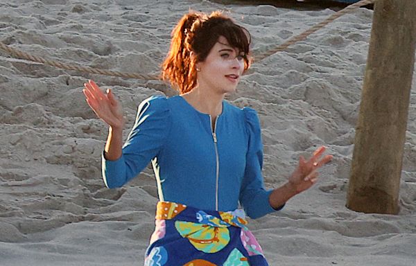 Zooey Deschanel rocks a bathing suit with Charlie Cox while filming Merv