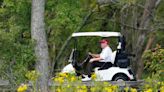 Trump spotted at his Virginia golf course after video of him on a flight to the DC area sparked a firestorm of speculation