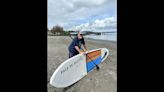 He’ll paddle from Tacoma to Port Townsend — on a board made of trash. Here’s why
