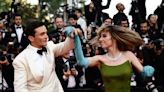 Maya Hawke danced down the Cannes red carpet in a colorful Prada gown with British actor Rupert Friend