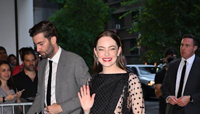 Emma Stone’s Husband Dave McCary Sweetly Carried Her Purse as She Arrived at Her Premiere