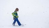 Surprise snow? Storm dumps flakes over about a dozen states.