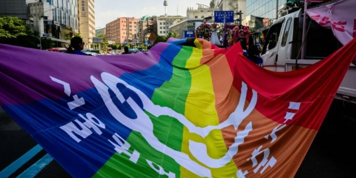 Top South Korea court hands gay couple 'historic' win on spouse rights