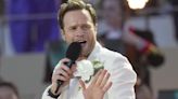 Olly Murs apologises for cancelling Glasgow gig with Take That after flight woes