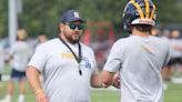 Football in bloodlines for new Hartland, Fowlerville coaches