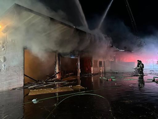 Firefighters respond to major structure fire in downtown Modesto, investigating cause