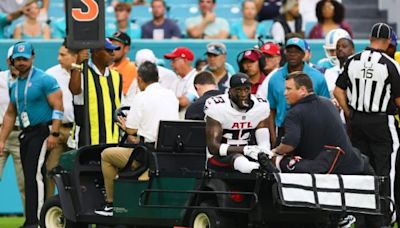 Falcons await news after S DeMarcco Hellams, LB Bralen Trice carted off field