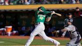 Murphy's 3-run homer helps A's split DH with Tigers