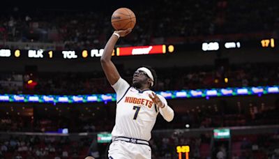 Sources: Nuggets PG Jackson picking up option