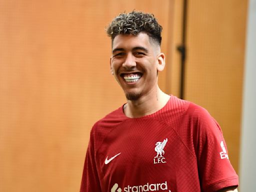 Robert Firmino sends football world into meltdown after posing in a Premier League kit - that isn't Liverpool's