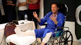 Pakistan's ex-PM Khan pauses protest march after shooting