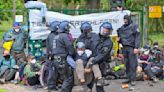 Protesters try to enter Tesla factory grounds outside Berlin