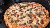 Le Creuset Just Dropped a Pizza Stone That Makes It Easy to Make Pizzeria-Quality Pies at Home