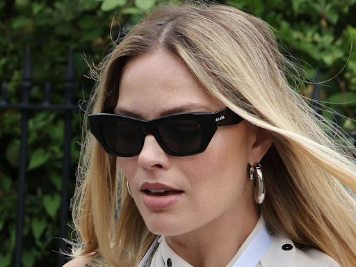 Margot Robbie Debuts Her Baby Bump in a Floaty Polka Dot Cape Dress at Wimbledon