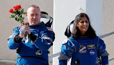 Why are NASA astronauts Sunita Williams and Barry Wilmorestuck in space and how might they get down
