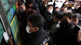 South Korea police raid home of suspect who stabbed opposition leader in neck