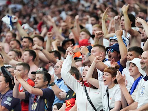 Fans celebrate as Bellingham helps England to dramatic comeback victory at Euros