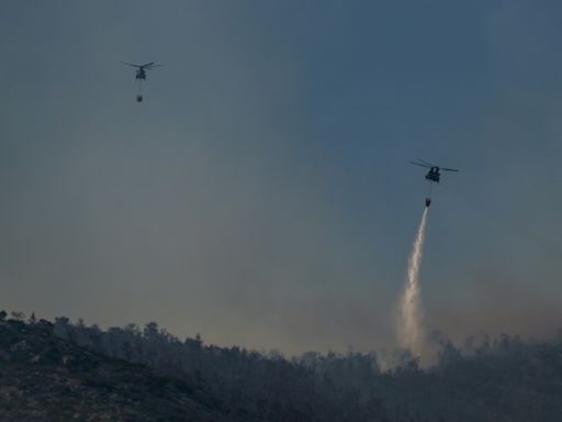 Greece fighting dozens of wildfires braces for worse to come