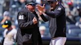 Yankees manager Aaron Boone is ejected 5 pitches into a game. He says a fan berated the umpire