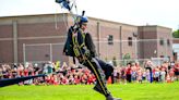 Sailors in Spokane: Naval parachute team jumps from a plane and touches down at St. Aloysius school