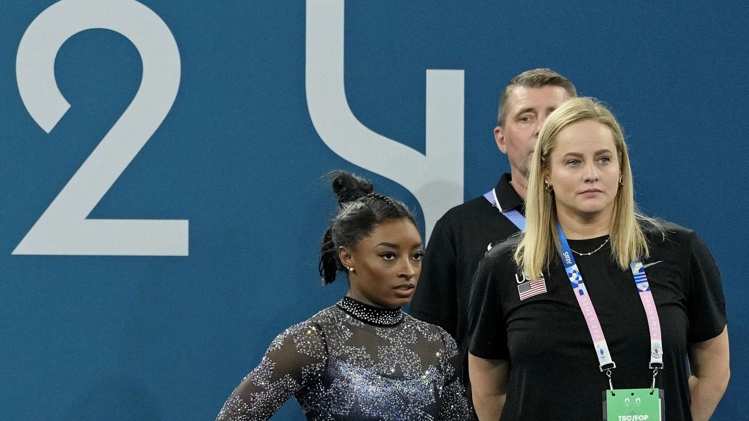 Simone Biles tweaks left ankle at Olympic qualifying, but keeps competing