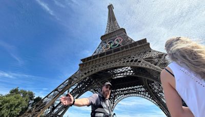 Eiffel Tower evacuated after man seen climbing up the structure, police say