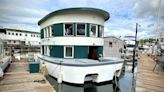 A cabin on the water awaits the new owner of Hobo the Houseboat - Unreal Estate