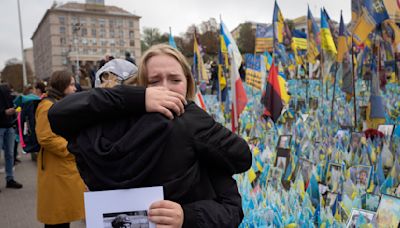 At least six killed by suspected Russian artillery strike on Ukrainian market