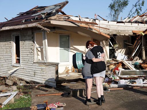 Dozens trapped in FedEx facility as tornadoes devastate US Midwest