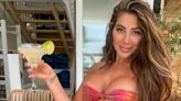 Chloe Ferry flaunts her curves in a tiny bandeau bikini on holiday