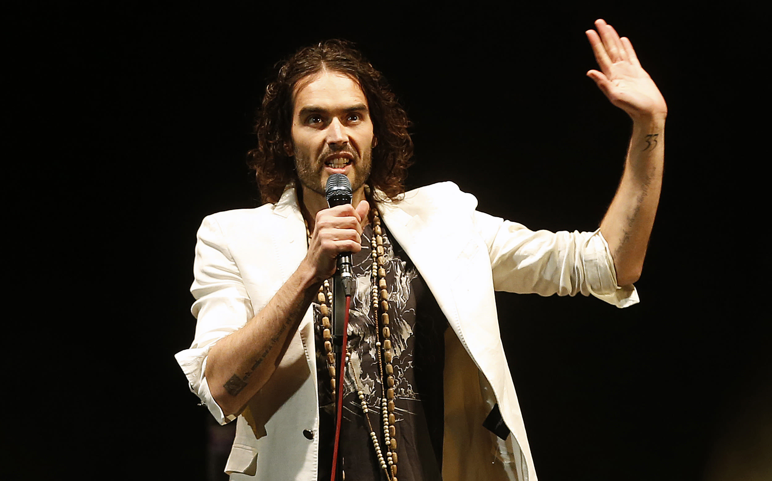 Russell Brand says Bear Grylls 'flanked' him as he was baptised in Thames