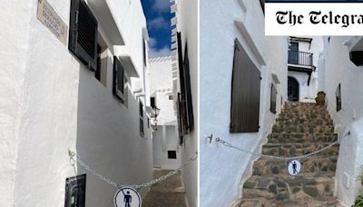 Menorca residents put chains on streets to keep tourists out