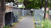 Protesters tear down controversial fencing along the Grand Canal